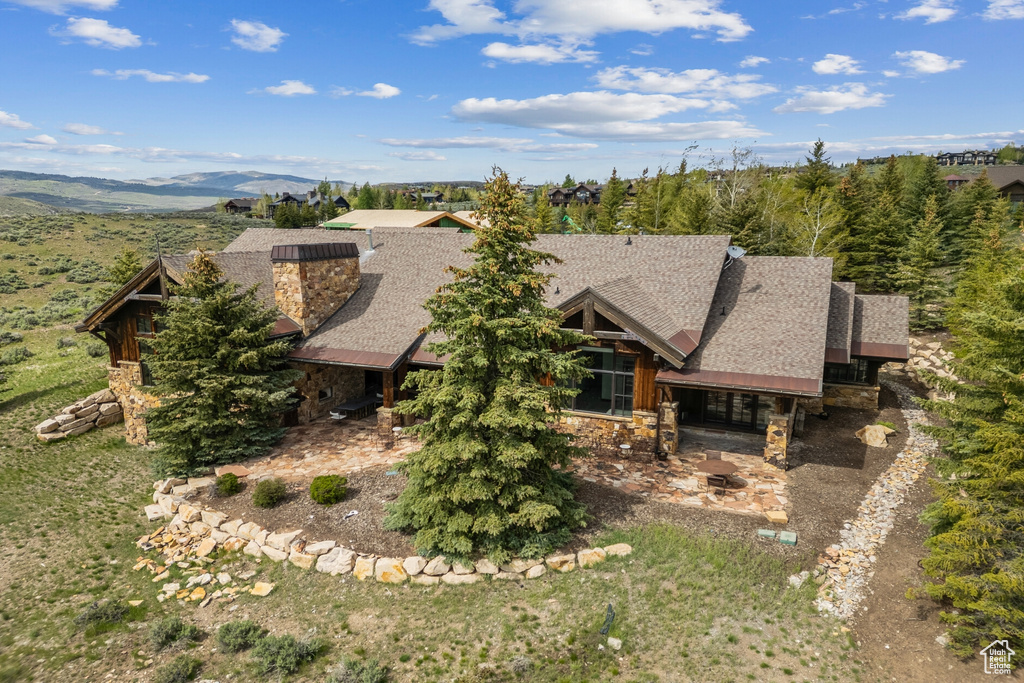 View from above of property featuring a mountainous background
