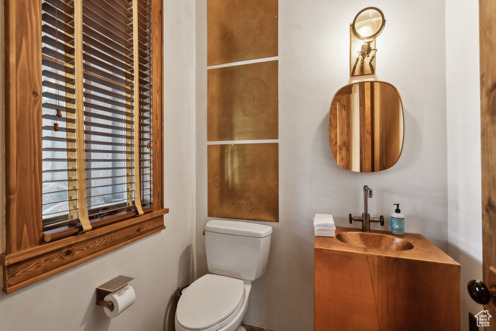 Bathroom featuring toilet and vanity