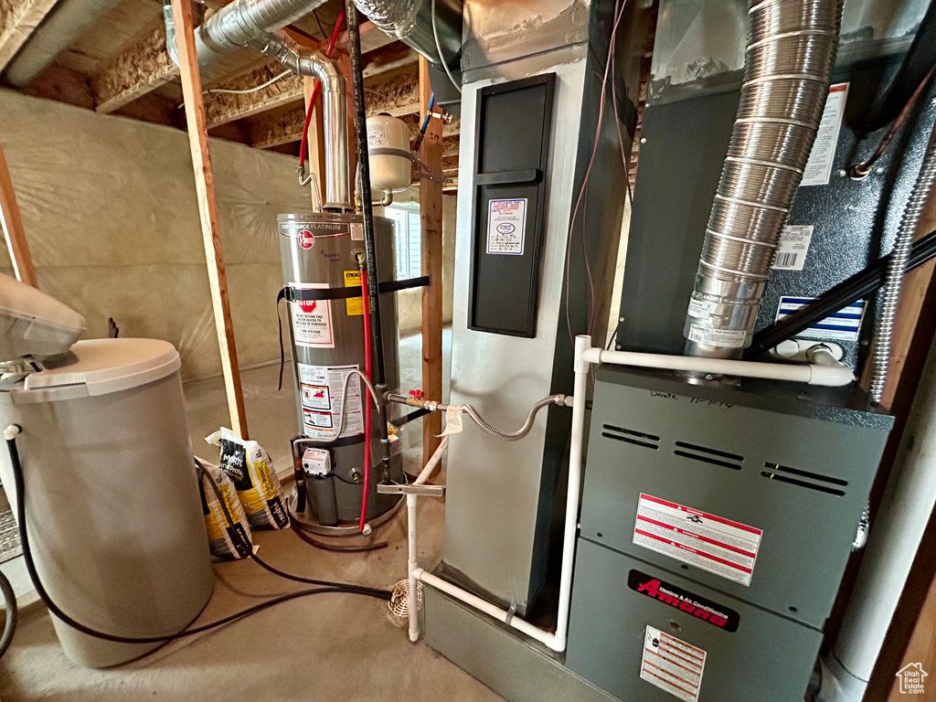 Utility room with strapped water heater
