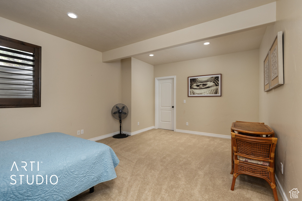 Carpeted bedroom with recessed lighting and baseboards