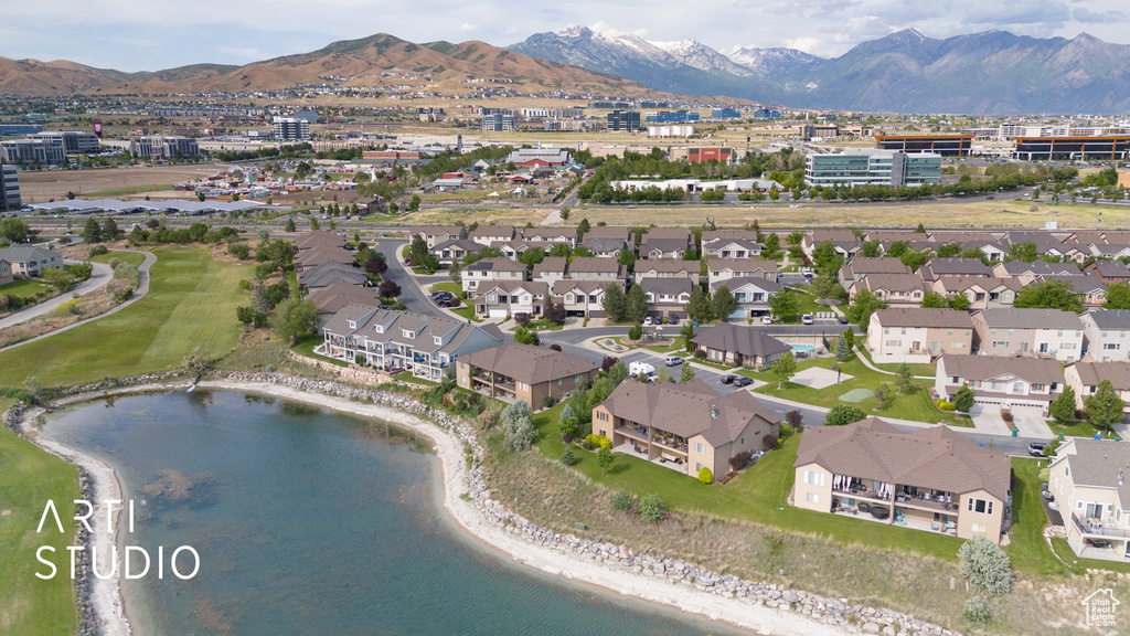 Aerial overview of property\\\\\\\\\\\\\\\'s location featuring a water and mountain view and nearby suburban area