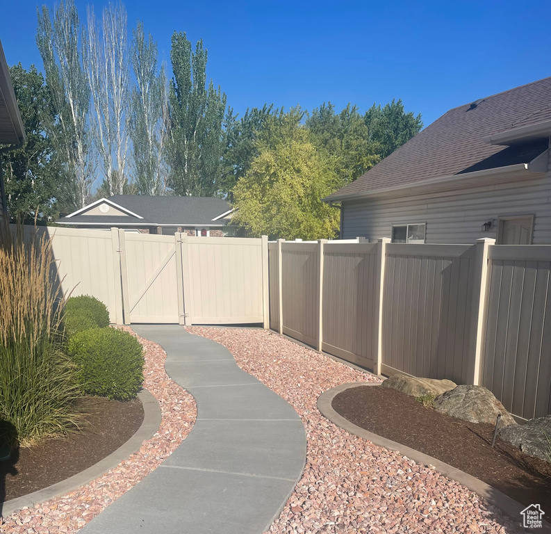 View of yard with a gate