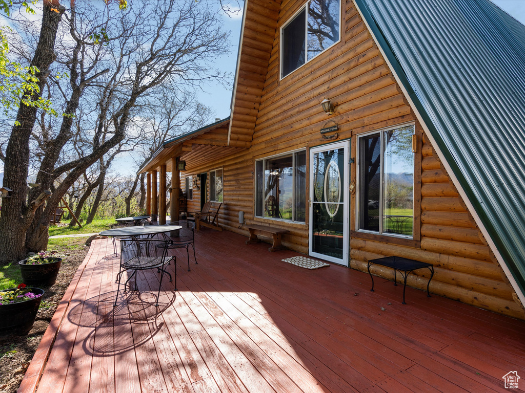 Wooden terrace with outdoor dining area
