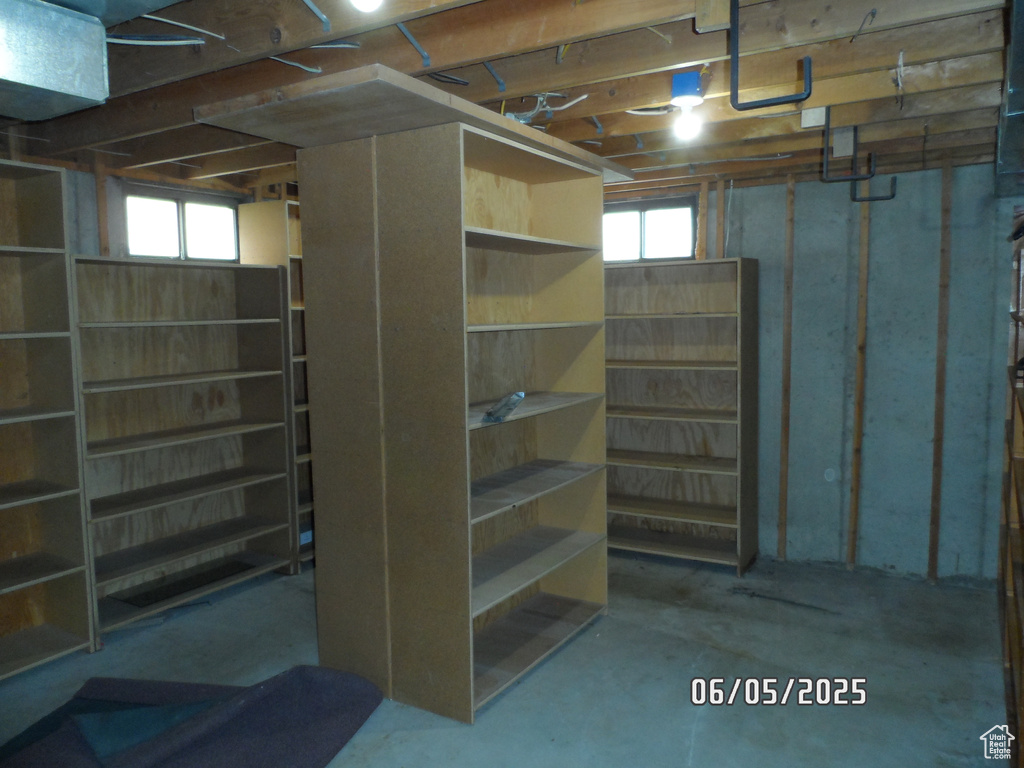 Basement featuring plenty of natural light