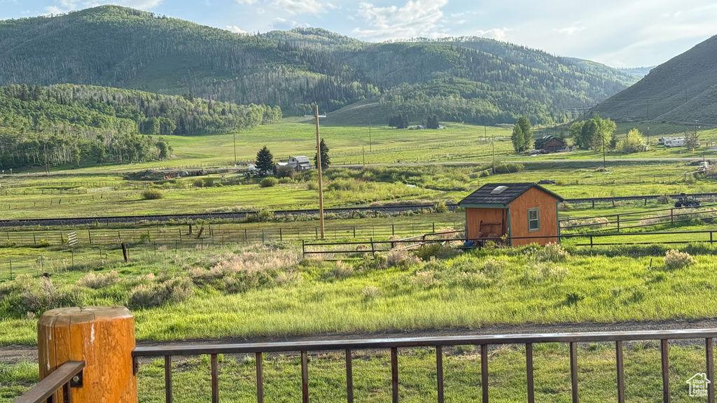 View of mountain background featuring rural landscape and a pastoral area