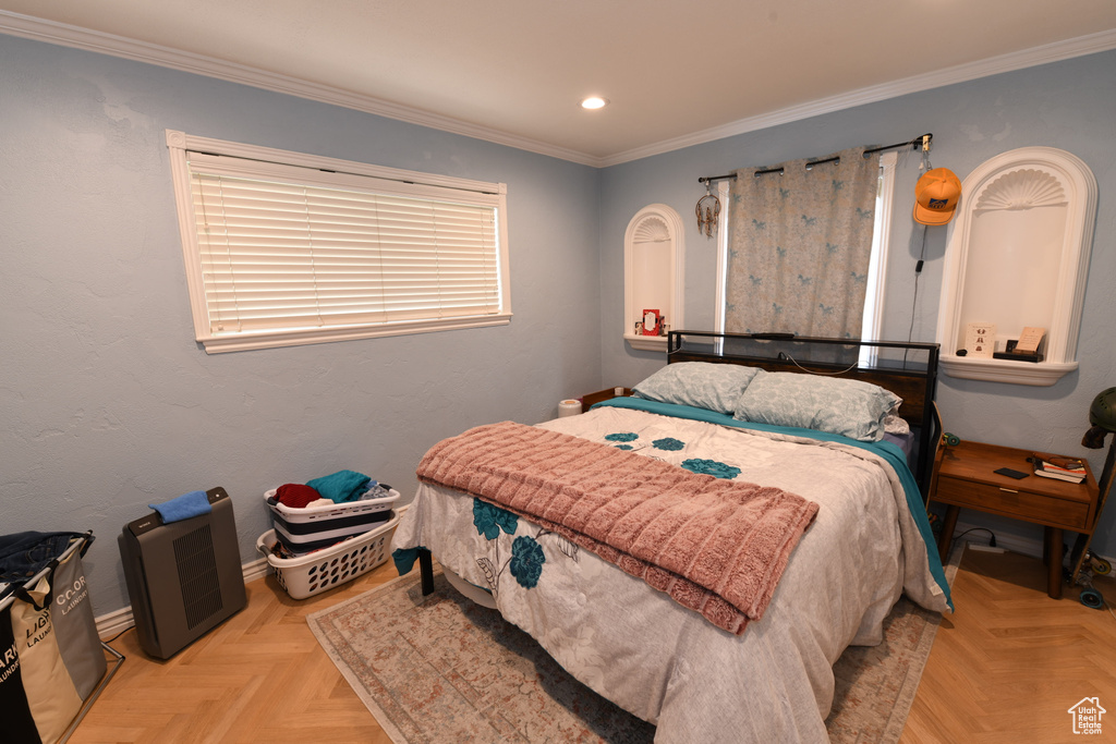 Bedroom with recessed lighting, ornamental molding, and baseboards