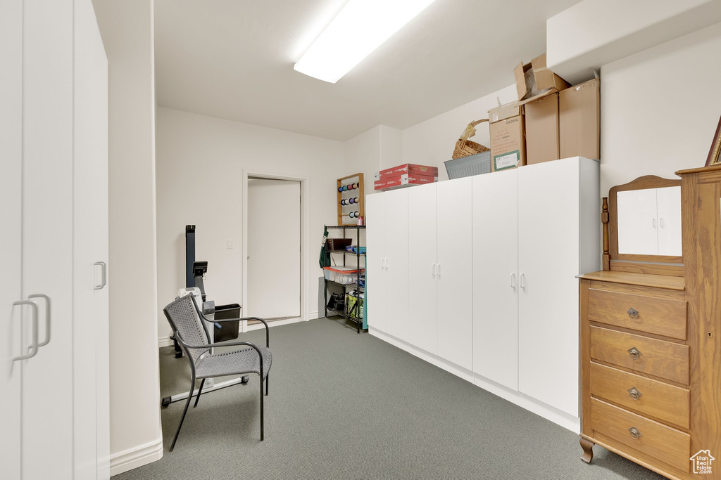 Living area featuring carpet flooring