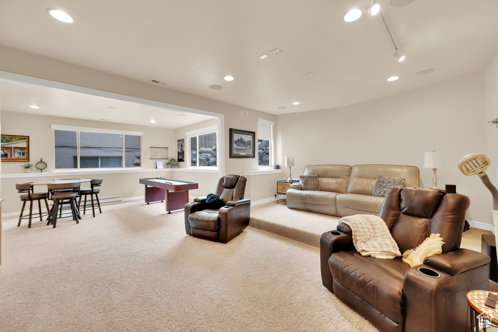 Carpeted living room featuring recessed lighting, baseboards, and billiards table