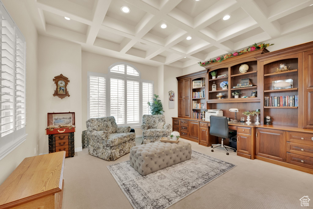 Office space featuring carpet, built in desk, recessed lighting, beam ceiling, and coffered ceiling