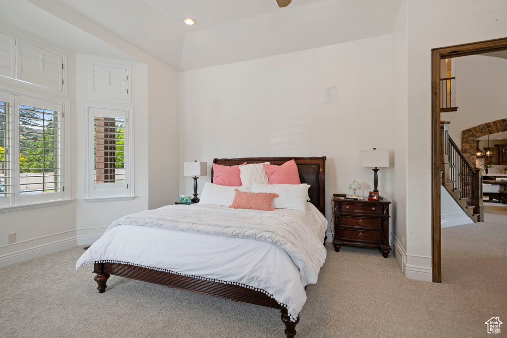 Carpeted bedroom with baseboards