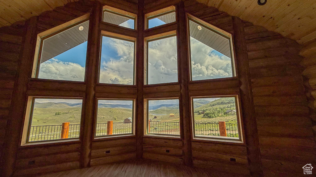 Detailed view of wood finished floors and wood ceiling
