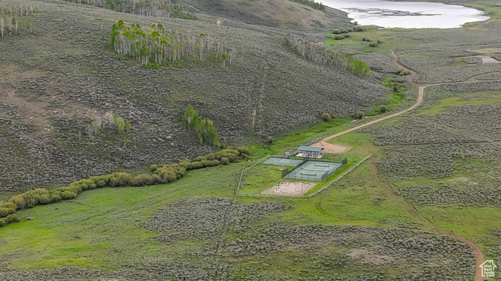 Aerial view of property and surrounding area with rural landscape