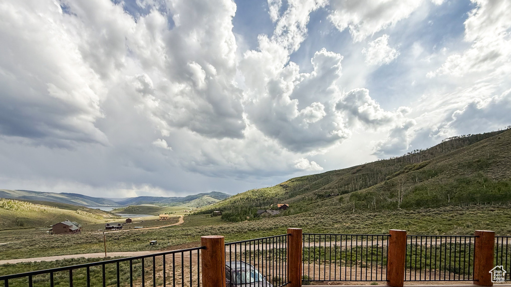 View of mountain background featuring rural landscape