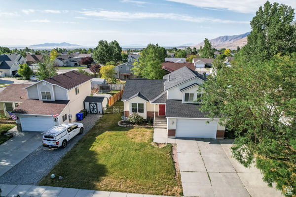 Aerial view of residential area with a mountainous background