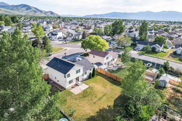 Aerial view of residential area with mountains