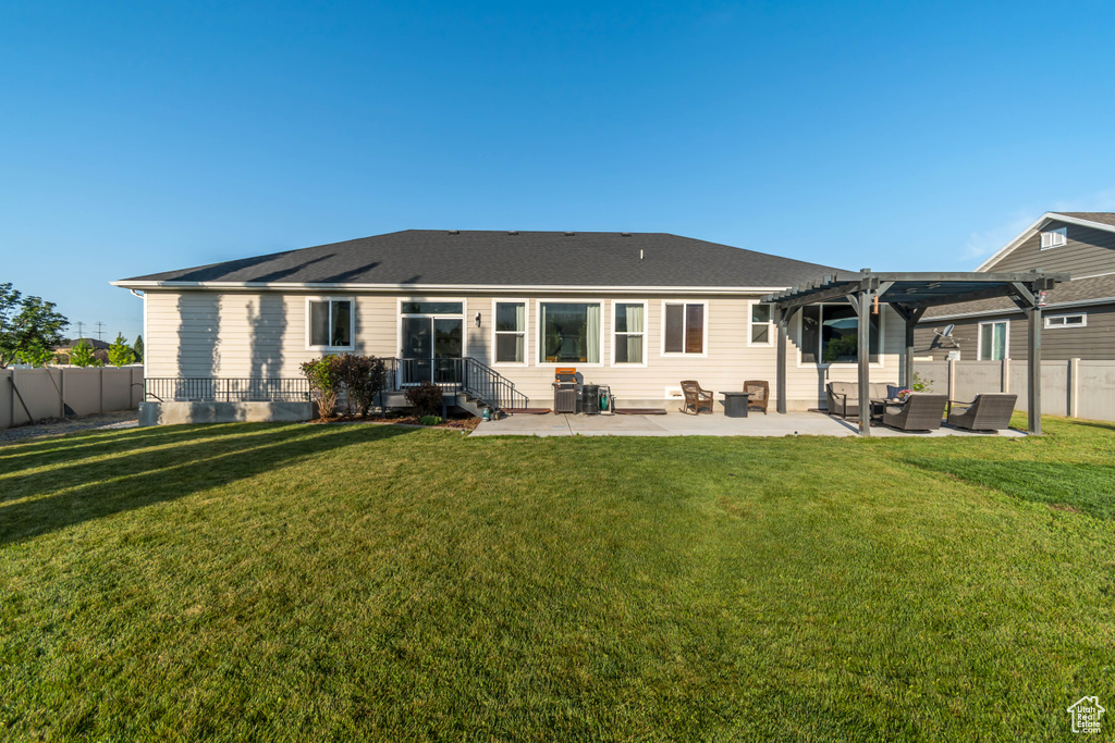 Rear view of house with a pergola, a patio, an outdoor living space, and roof with shingles