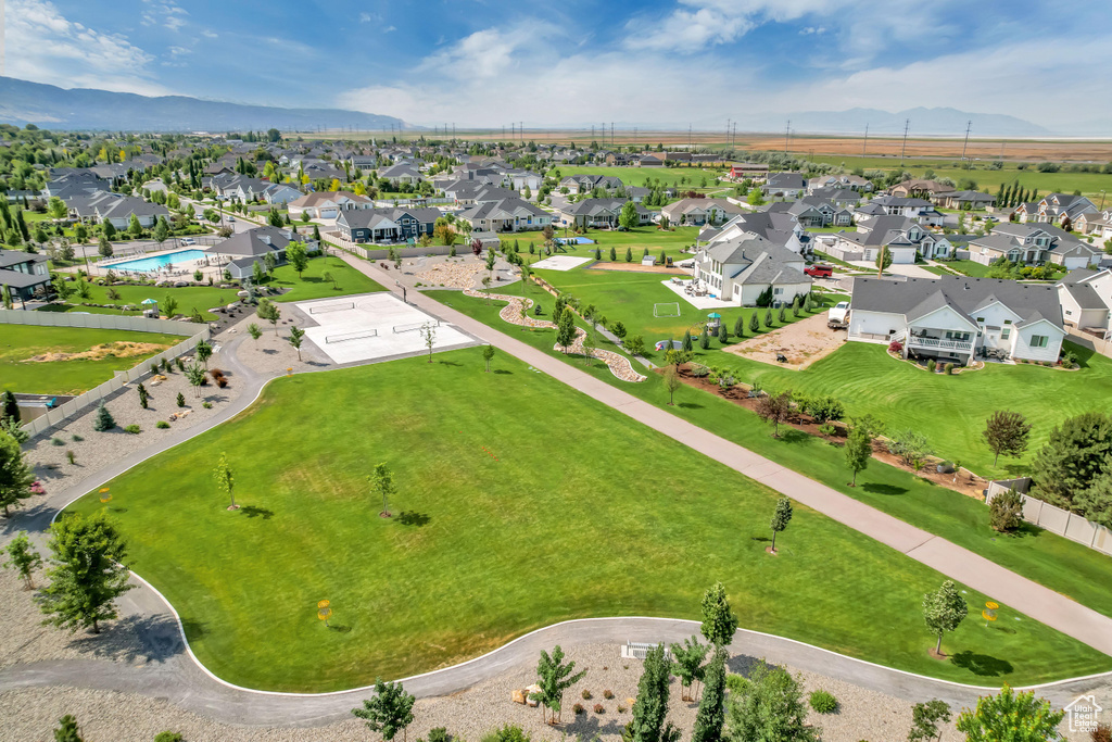 Aerial view of residential area featuring mountains
