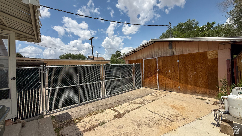 View of yard featuring a gate