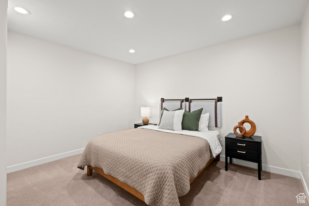 Bedroom with carpet, recessed lighting, and baseboards