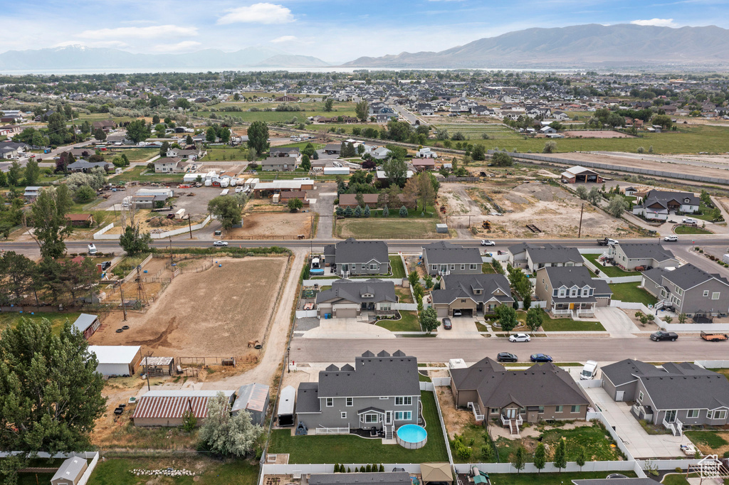 Aerial view of residential area with mountains