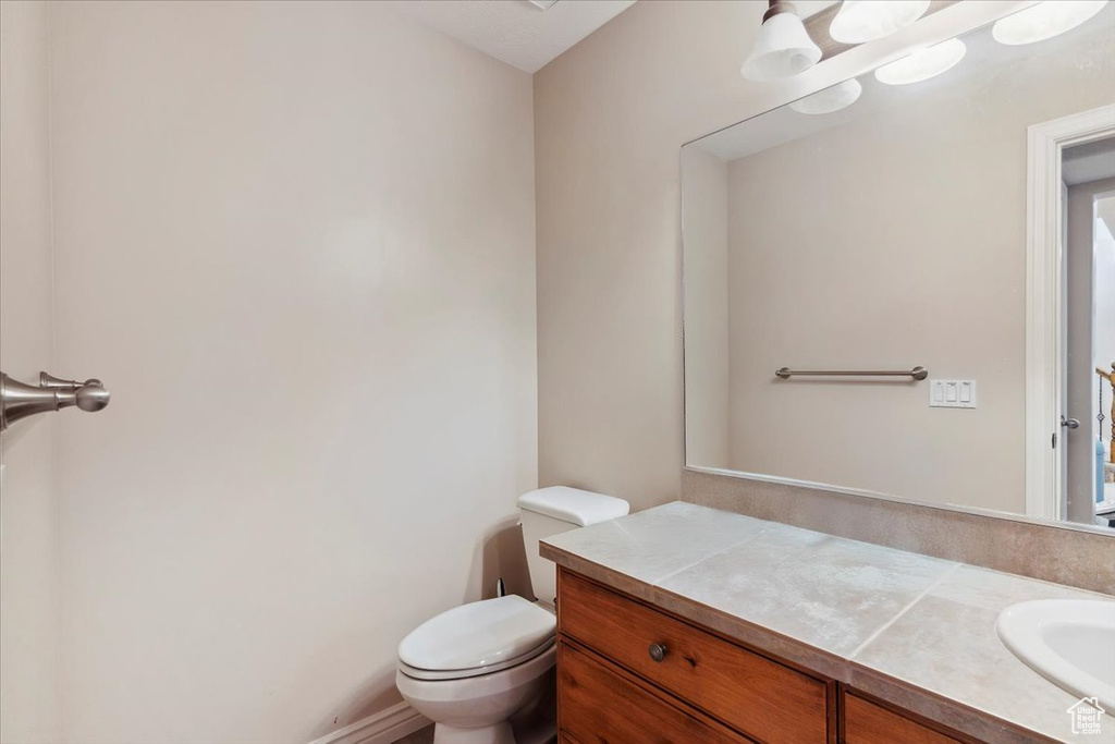 Bathroom featuring toilet and vanity