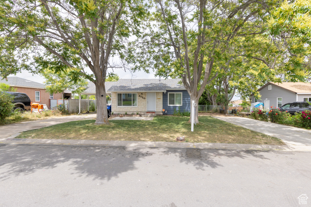 View of front of house with concrete driveway