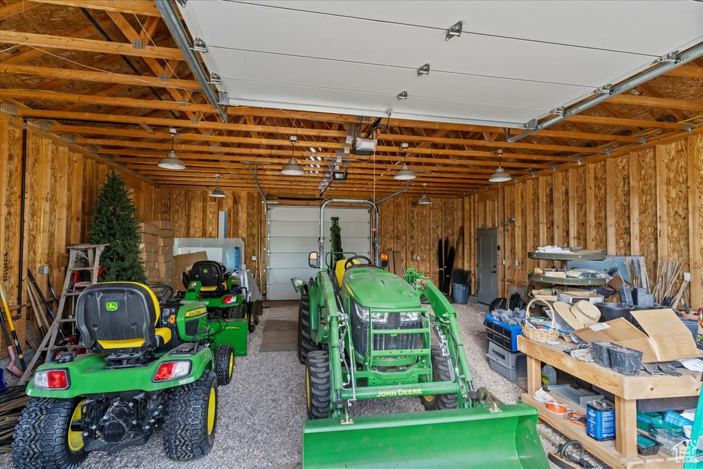 Garage featuring a garage door opener