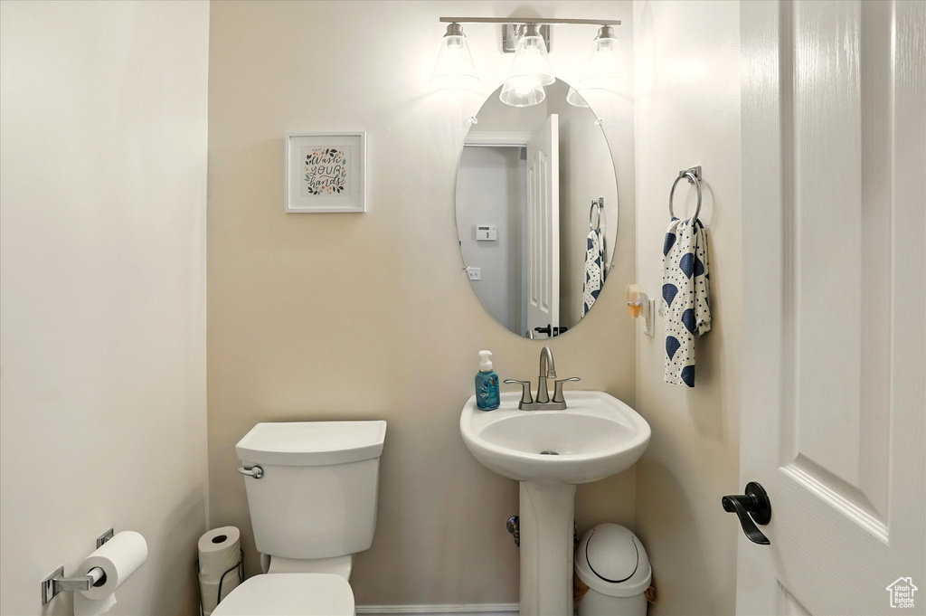 Half bathroom with toilet