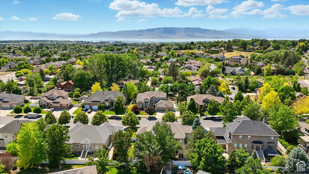 Aerial view of residential area with a mountain backdrop