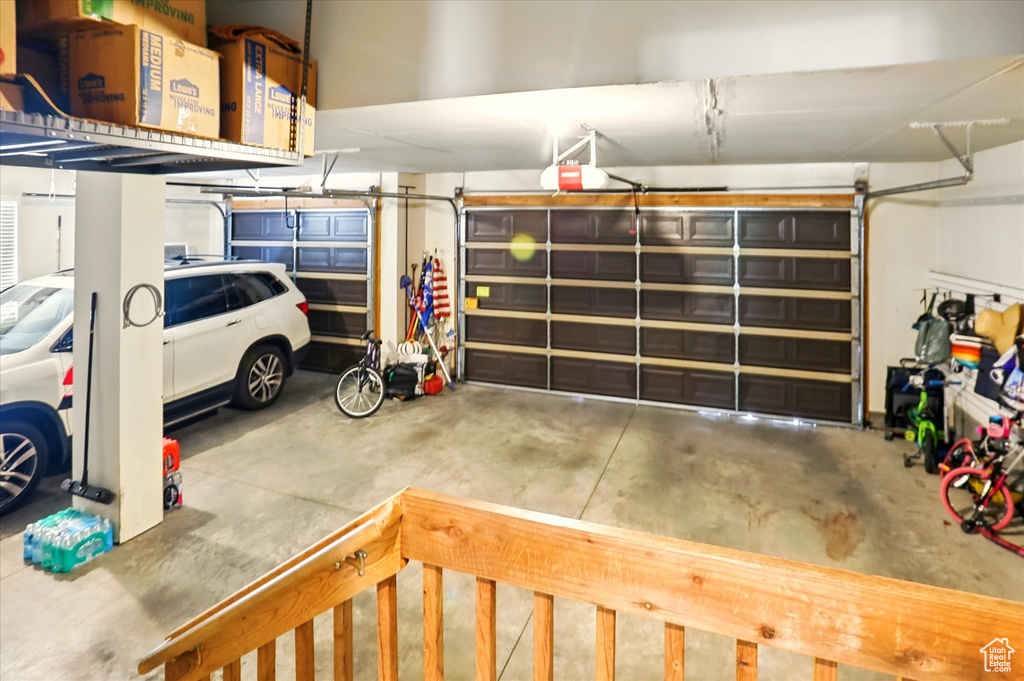 Garage featuring a garage door opener