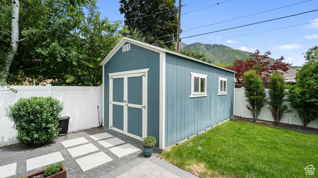 View of shed with a mountain view