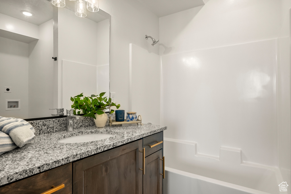 Full bathroom with vanity and shower / bathtub combination