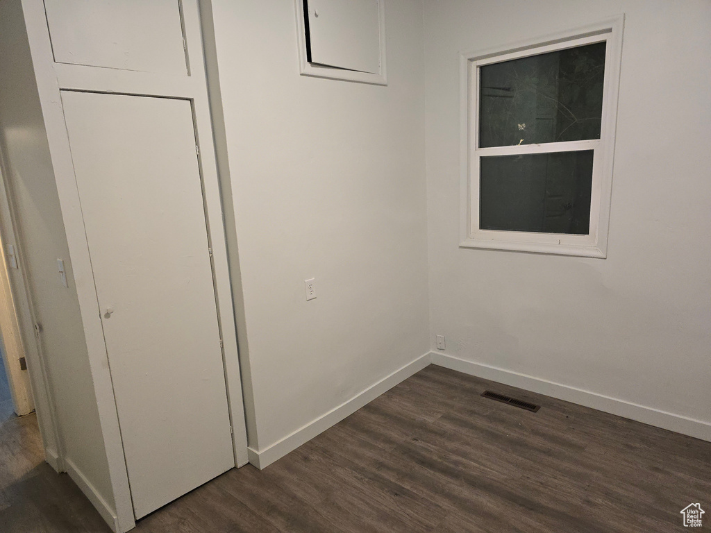Detailed view of wood finished floors and baseboards