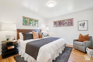 Bedroom with wood finished floors