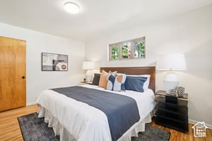 Bedroom with wood finished floors