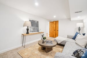 Living room with recessed lighting and baseboards
