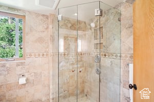 Full bath featuring a stall shower
