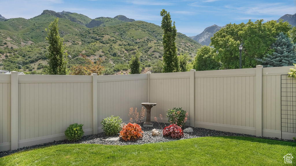 View of yard with a mountain view