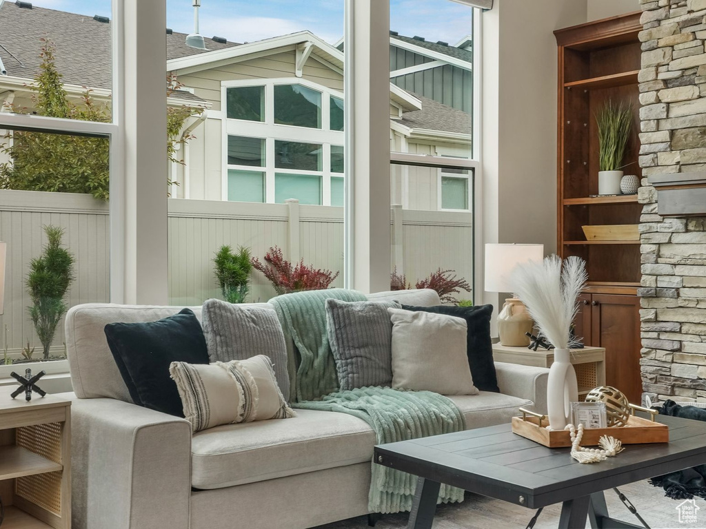 Living room featuring an outdoor stone fireplace