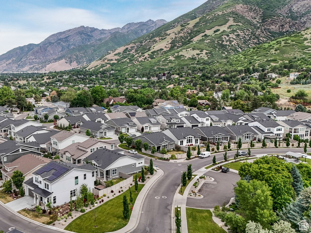 Aerial view of residential area with a mountain backdrop