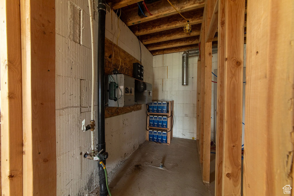 Basement with concrete block wall and electric panel