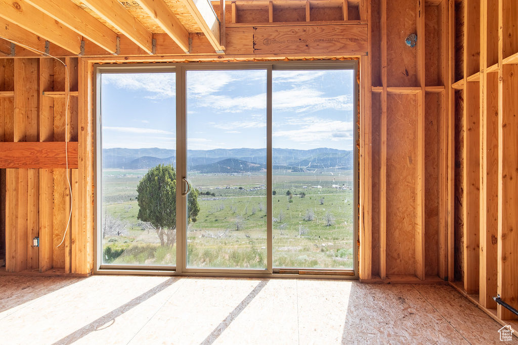Interior space featuring a mountain view and a view of countryside