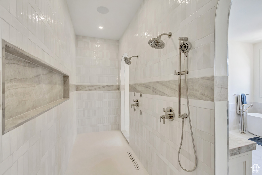 Bathroom with a tile shower