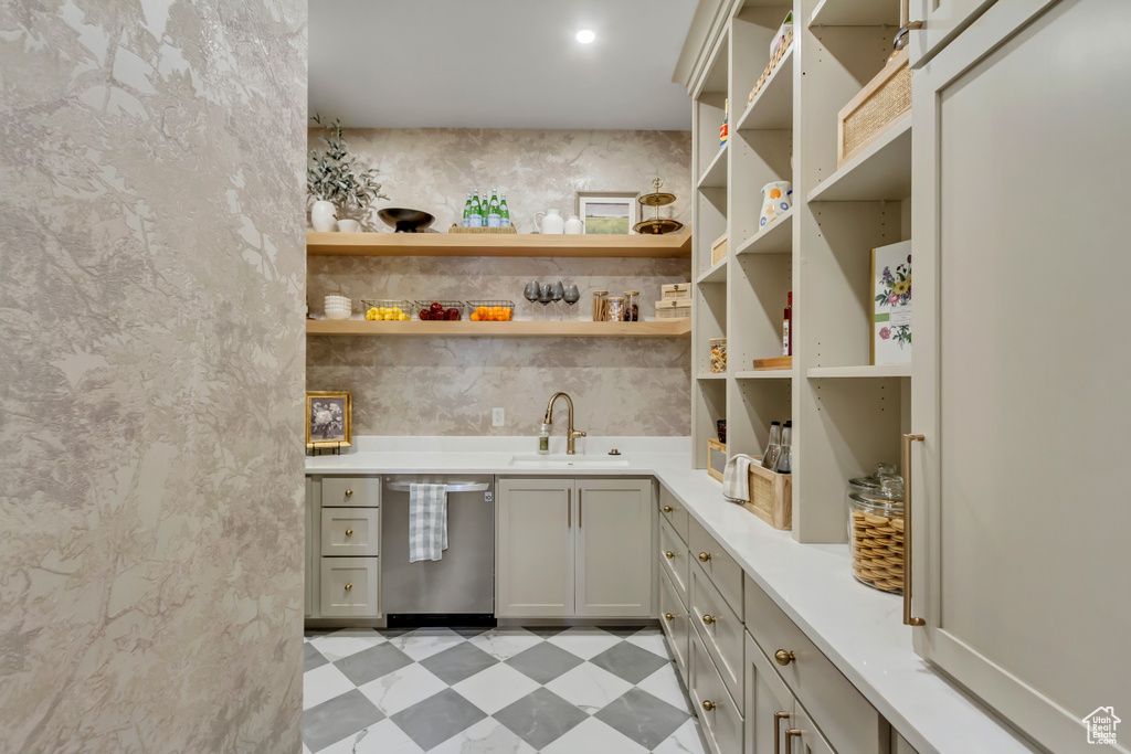Pantry featuring a sink