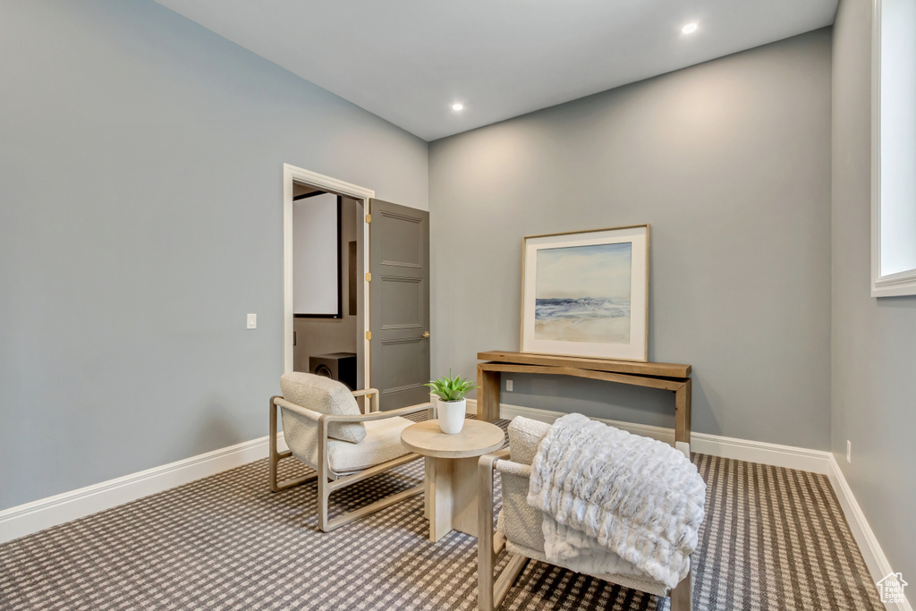 Sitting room featuring carpet floors and recessed lighting