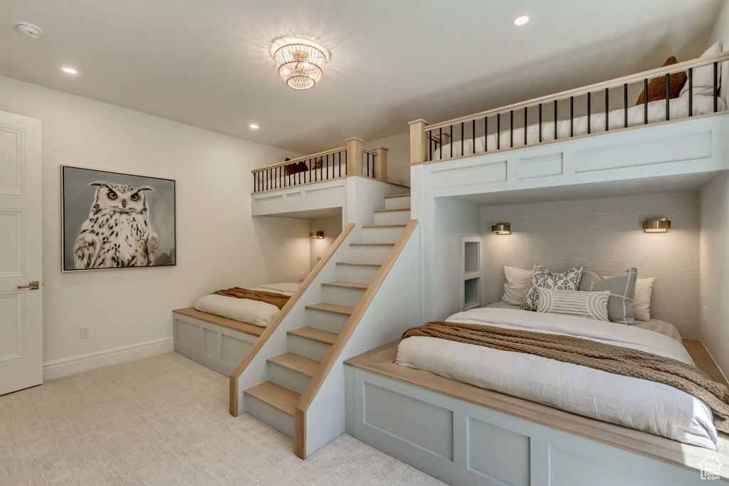 Bedroom featuring light carpet and recessed lighting
