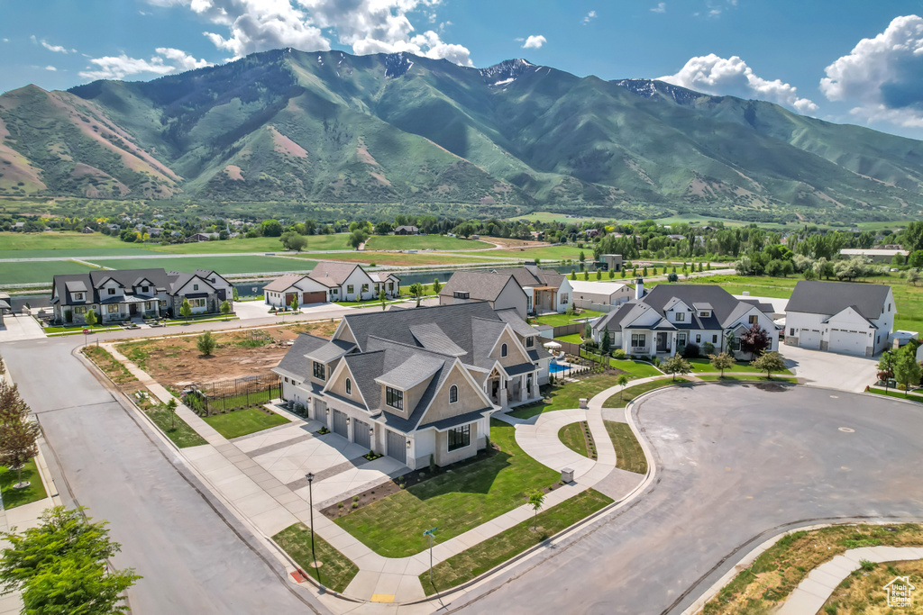 View of mountain background featuring nearby suburban area