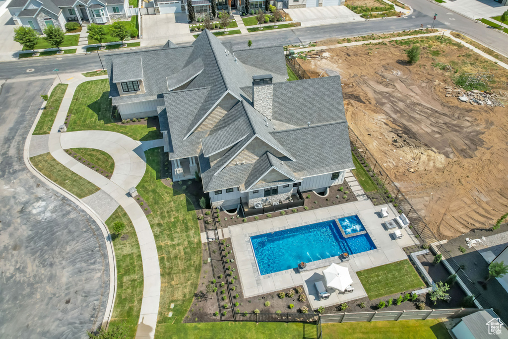 Aerial view of residential area with a pool area