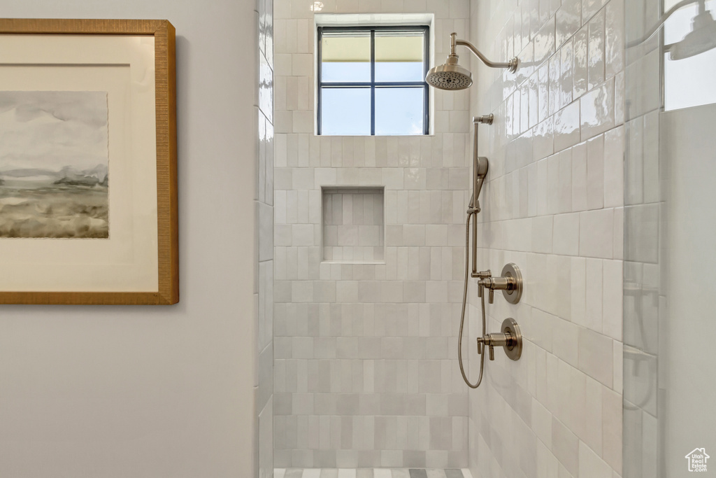 Bathroom with tiled shower
