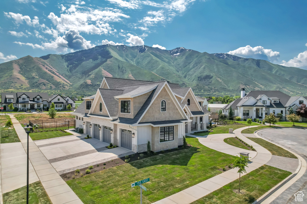 View of mountain backdrop with nearby suburban area